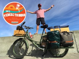 man with pedego electric cargo bike