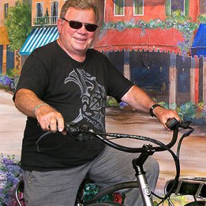 William Shatner on his Pedego Electric Bike