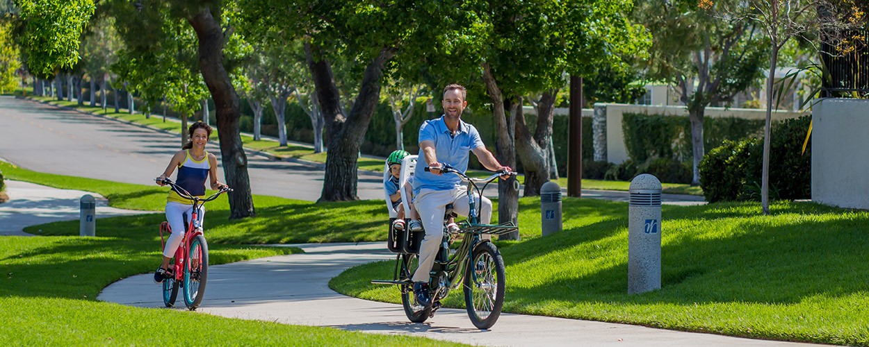 Family riding electric cargo bike