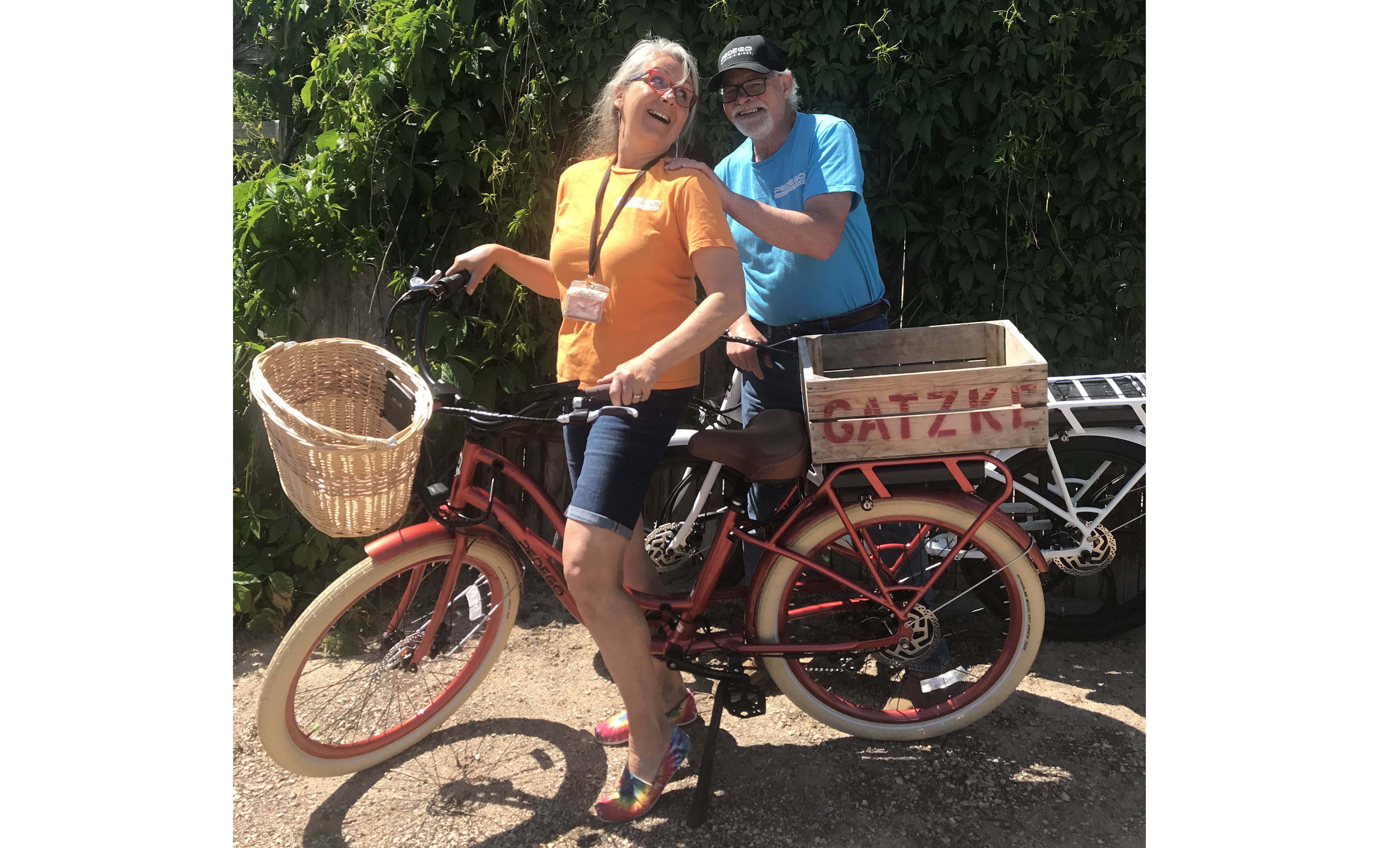 Pedego Oyama owners Murray and Sheila Fraser take a break from their electric bike riding.