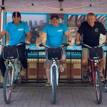 Pedego Calgary owner and his team each posed on a Pedego ebike.